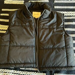Cropped black puffer vest